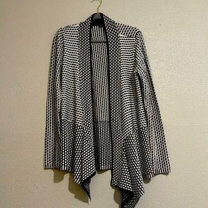 Beautiful two tone black/white sweater cardigan. Trimmed in black.